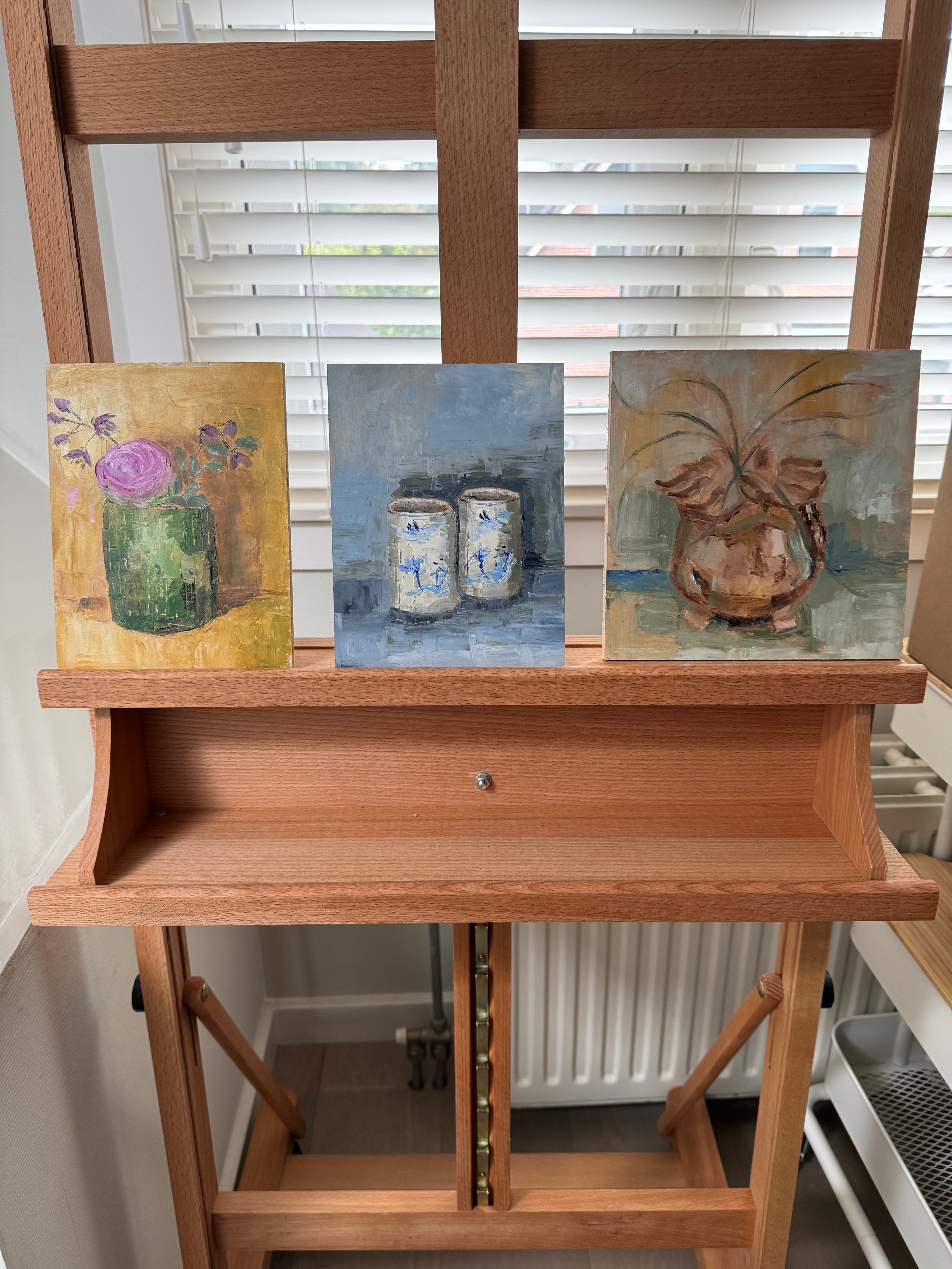 Vaasje met vogeltjes en plantje