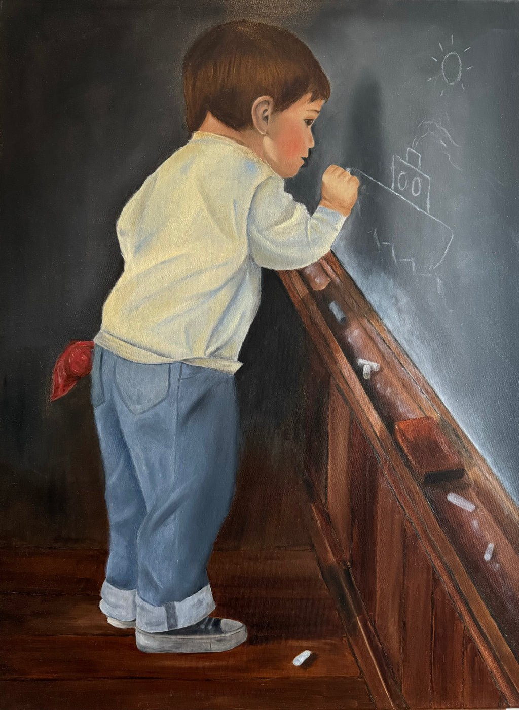 Boy draws on school board