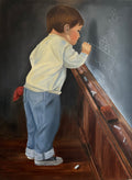 Boy draws on school board